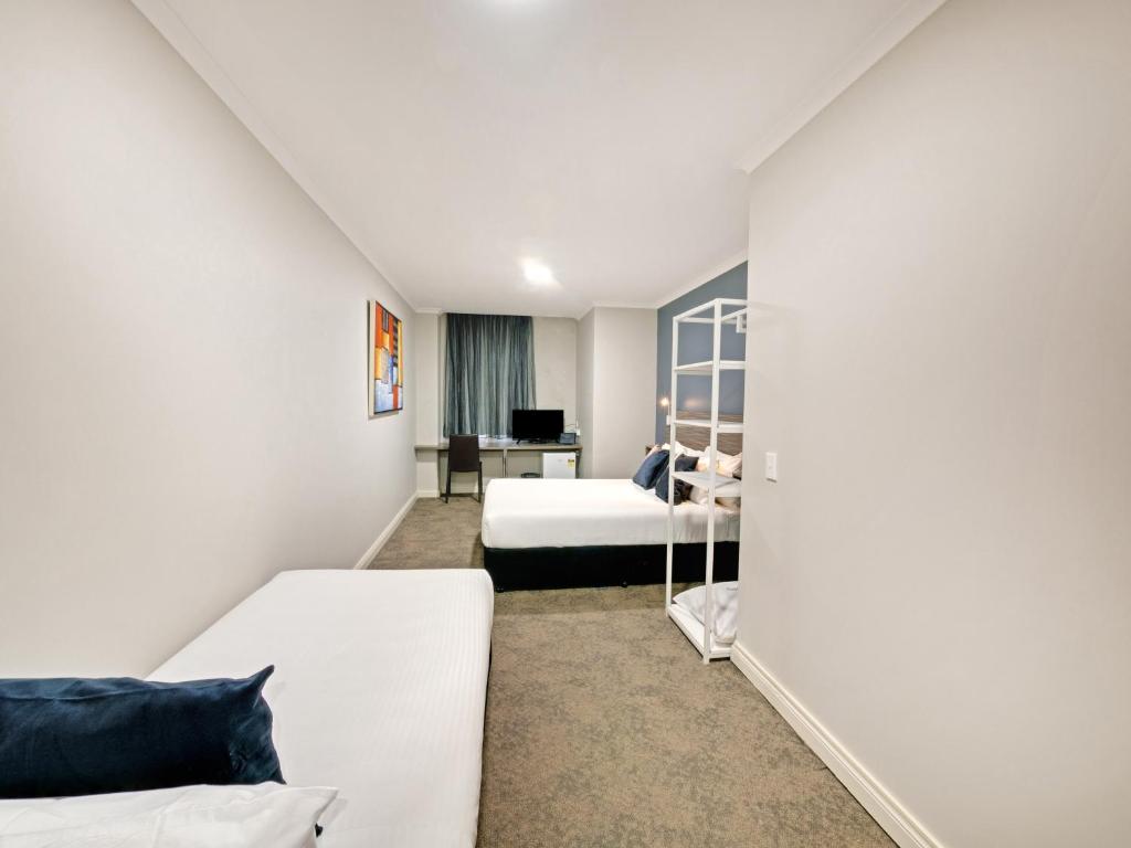 Postel nebo postele na pokoji v ubytování 28 Hotel