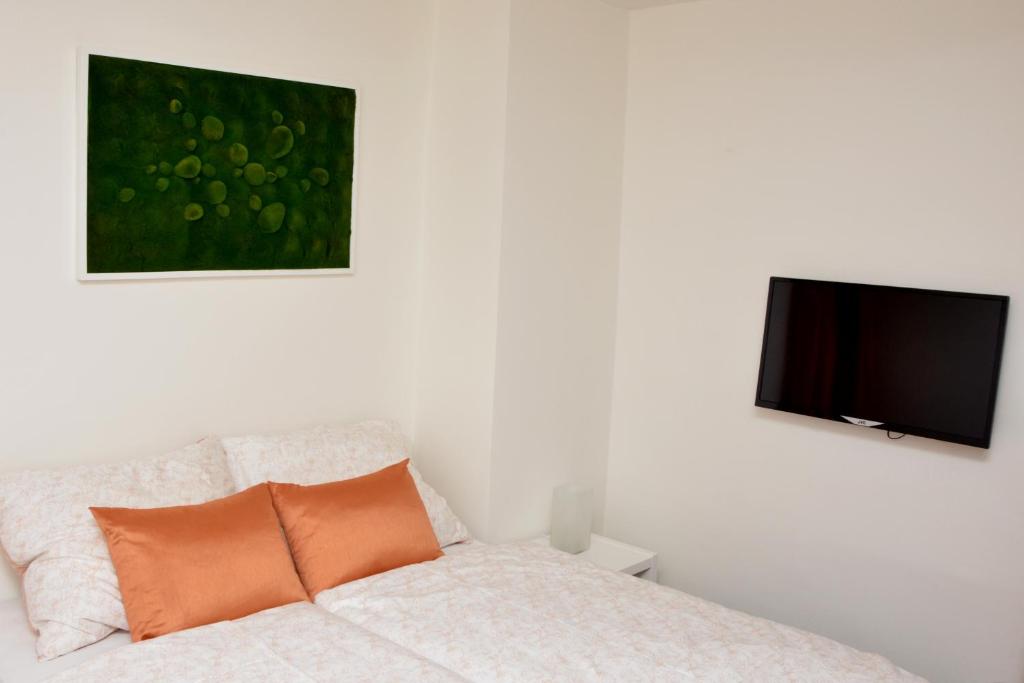 Postel nebo postele na pokoji v ubytování B&B À la montagne