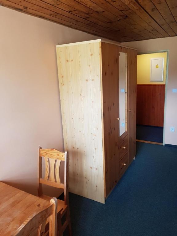 Postel nebo postele na pokoji v ubytování Pension Pod Hrádečkem
