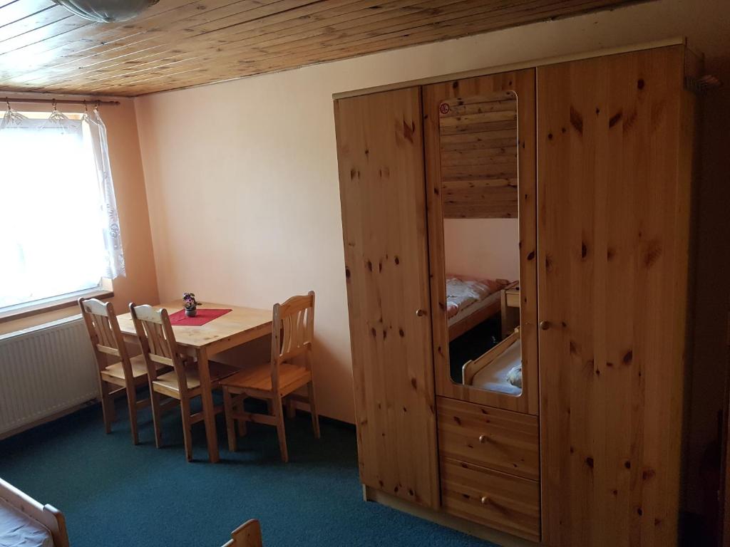 Postel nebo postele na pokoji v ubytování Pension Pod Hrádečkem