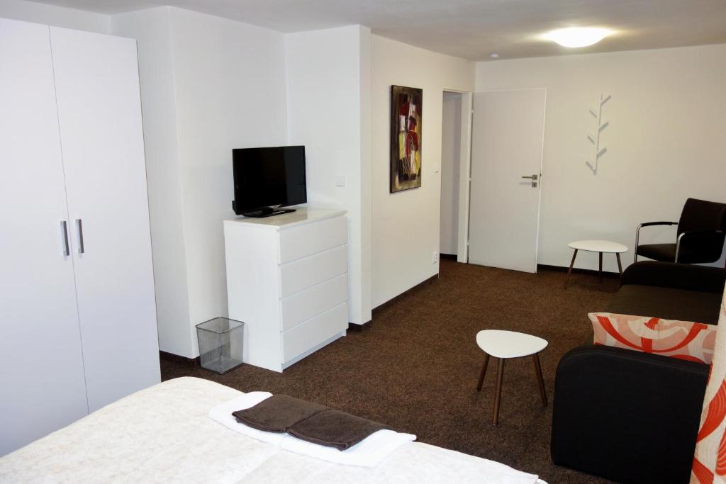 TV a/nebo společenská místnost v ubytování B&B À la montagne