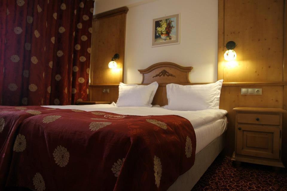 Postel nebo postele na pokoji v ubytování Resort Sf Petru