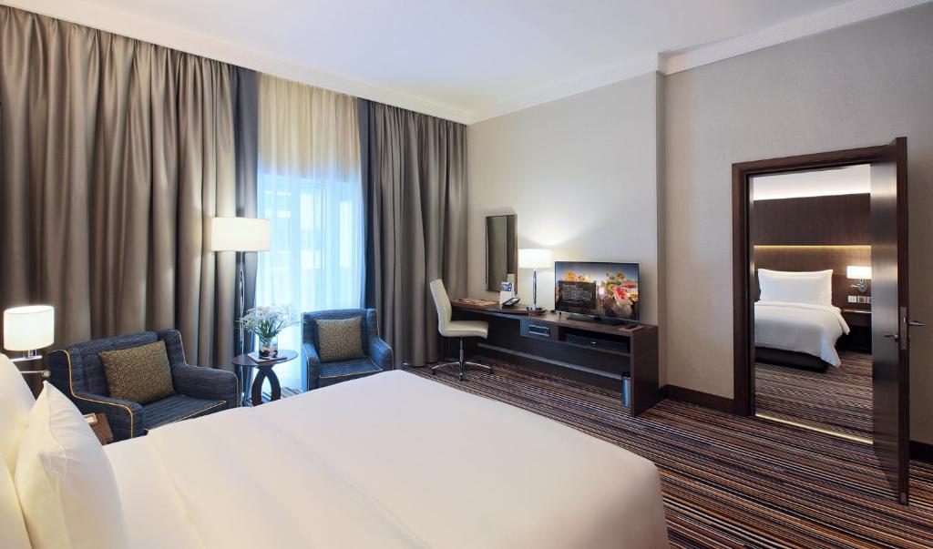 Postel nebo postele na pokoji v ubytování Dusit D2 Kenz Hotel Dubai