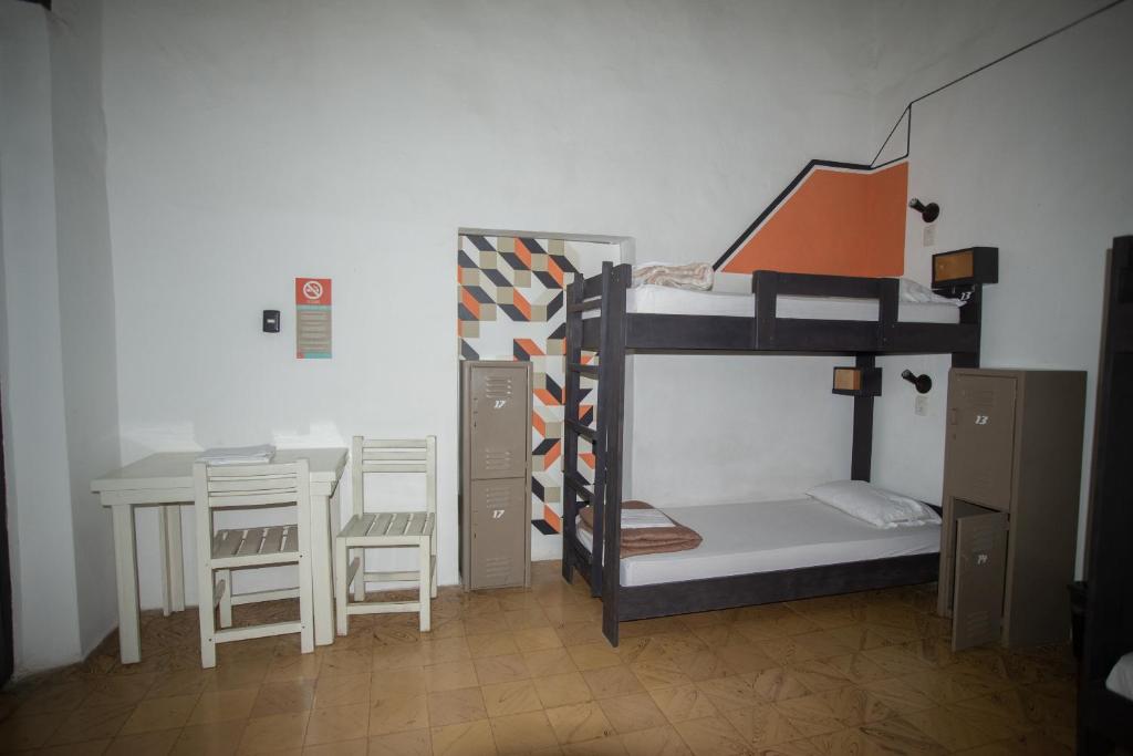 Postel nebo postele na pokoji v ubytování El Petate Hostel