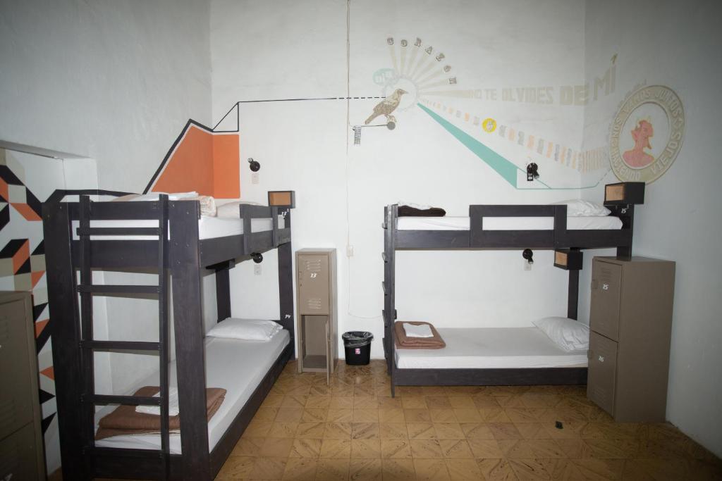 Postel nebo postele na pokoji v ubytování El Petate Hostel