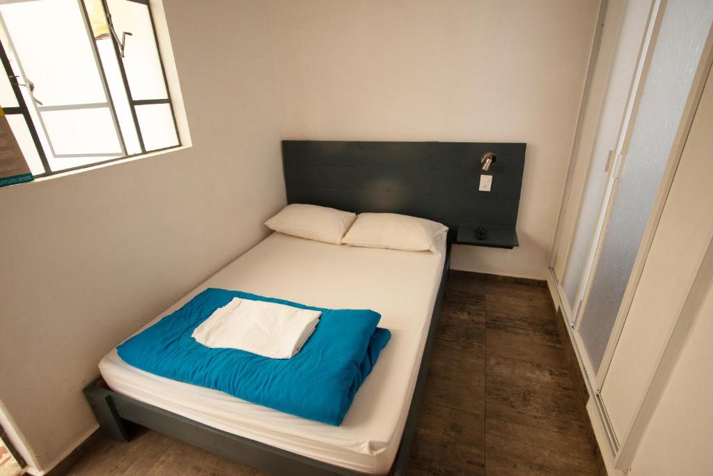 Postel nebo postele na pokoji v ubytování El Petate Hostel