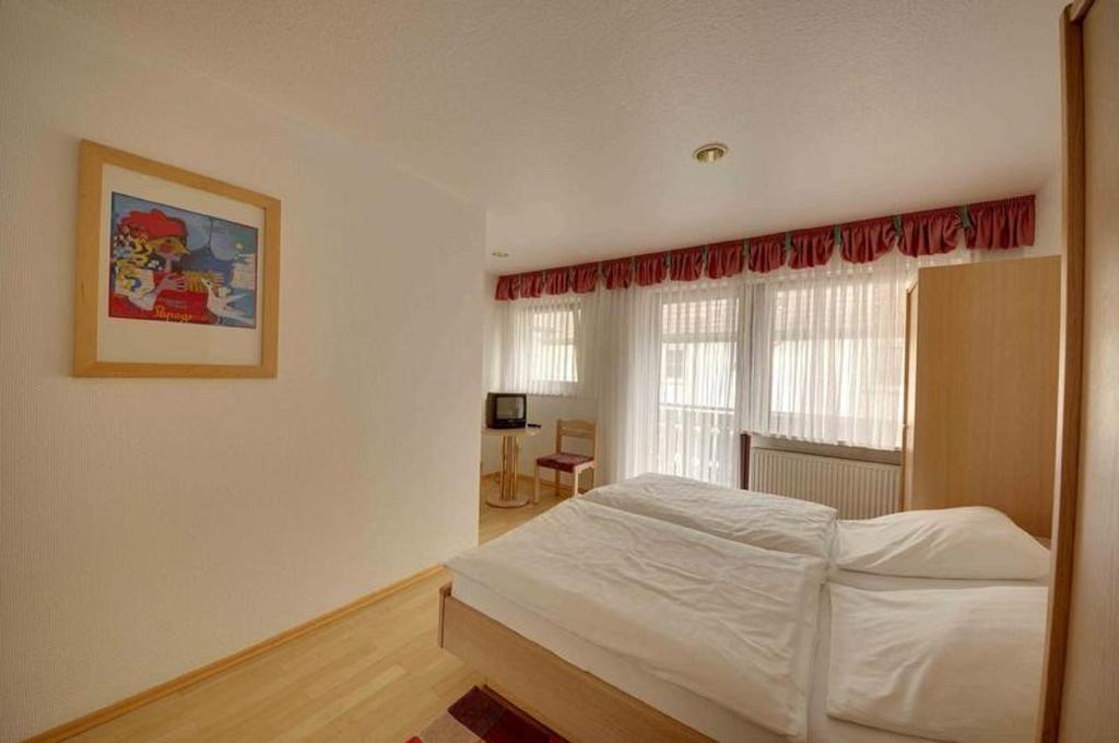 Postel nebo postele na pokoji v ubytování Gasthaus Straub