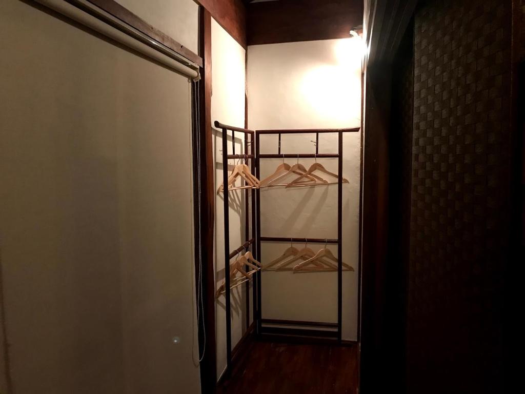 Ένα ή περισσότερα κρεβάτια σε δωμάτιο στο Guesthouse Wasabi