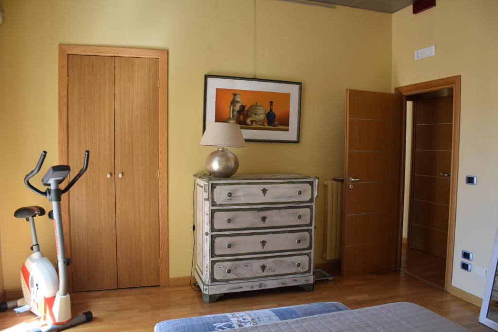 A bed or beds in a room at le case della baia di Napoli