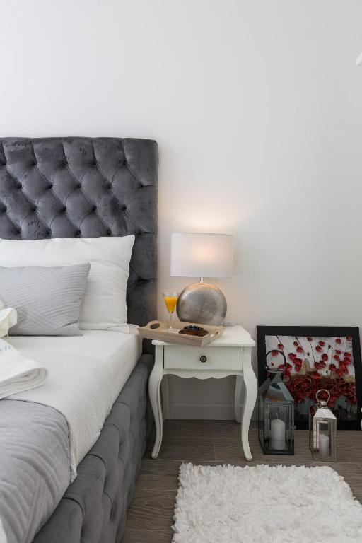 Posteľ alebo postele v izbe v ubytovaní Francesca Baroque Apartment