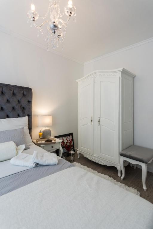 Posteľ alebo postele v izbe v ubytovaní Francesca Baroque Apartment