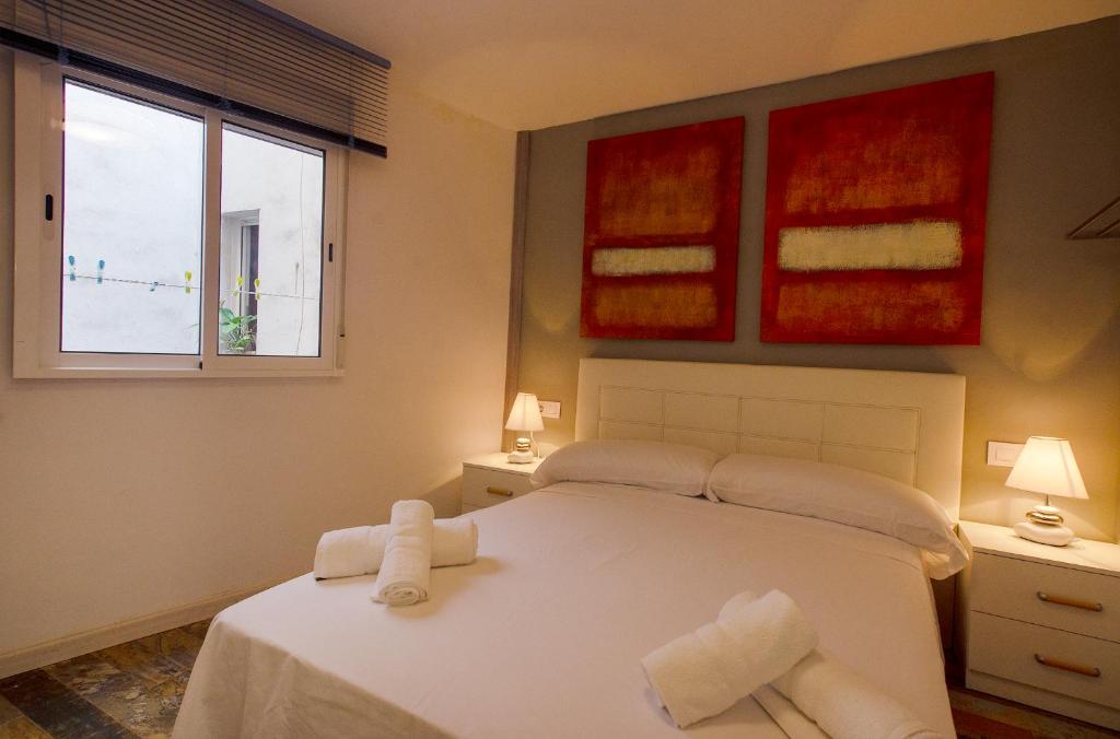 Postel nebo postele na pokoji v ubytování Santa Clara Apartments