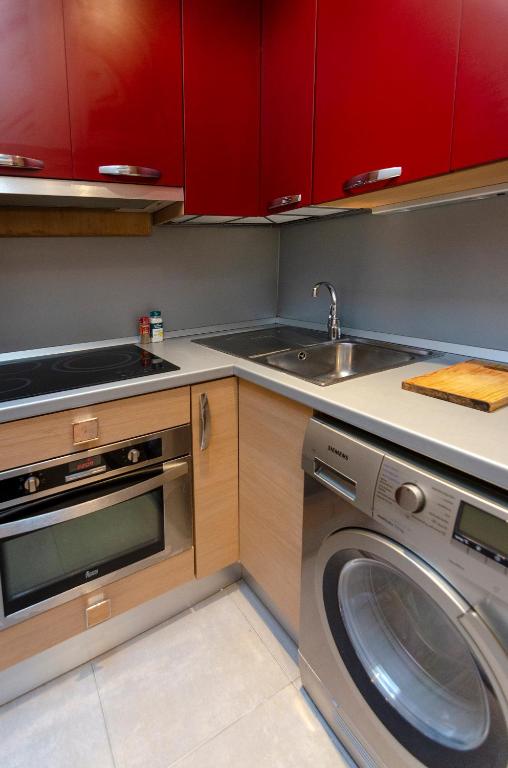 Kuchyň nebo kuchyňský kout v ubytování Santa Clara Apartments