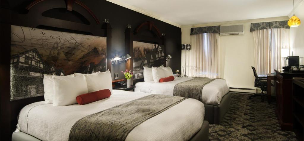 Postel nebo postele na pokoji v ubytování Chestnut Hill Hotel