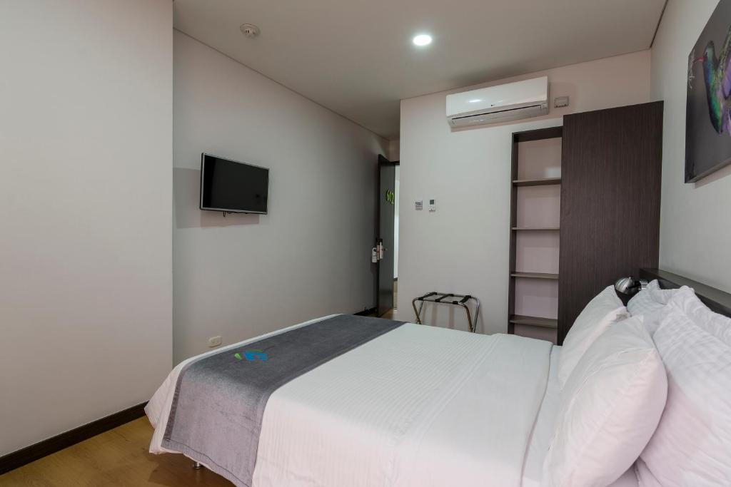 TV a/nebo společenská místnost v ubytování Hotel Vivre