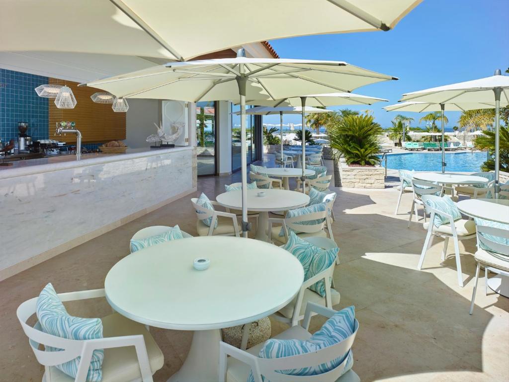 Um restaurante ou outro lugar para comer em Hotel Quinta do Lago