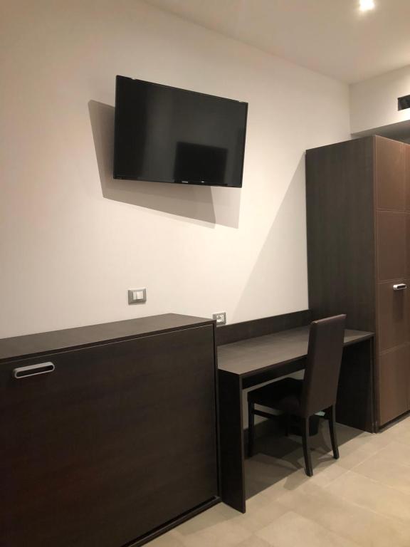 TV a/nebo společenská místnost v ubytování Ex-L