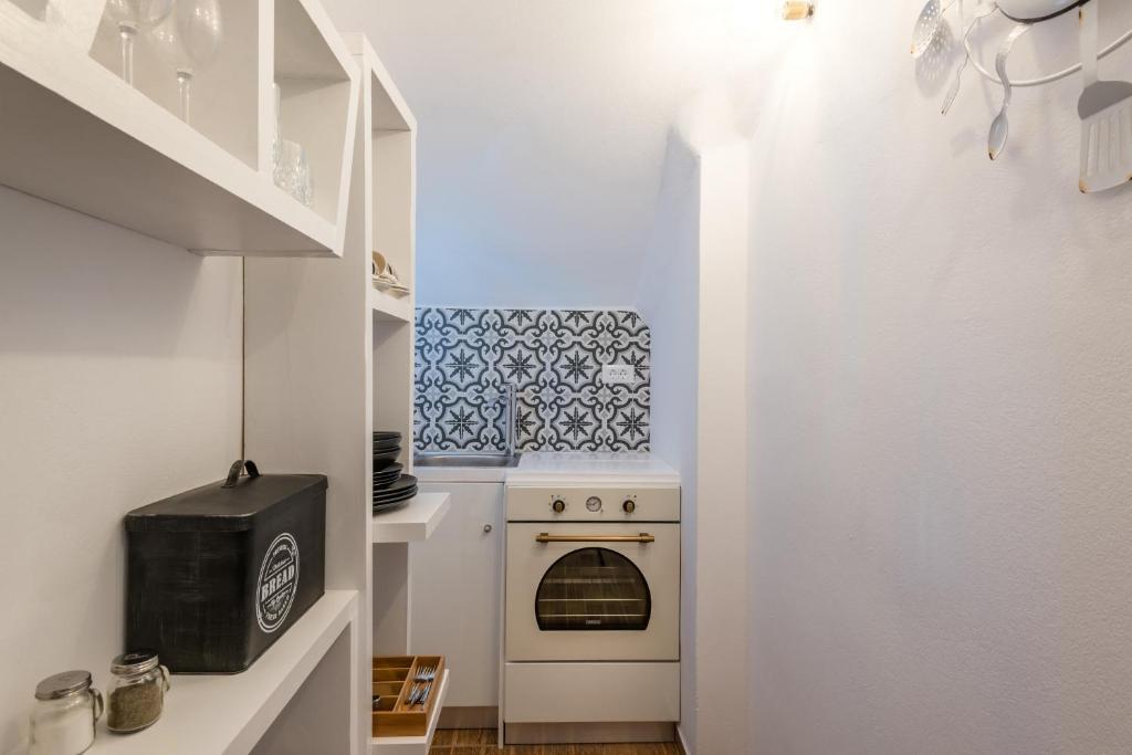 Kuchyň nebo kuchyňský kout v ubytování Summer Lovers Villa