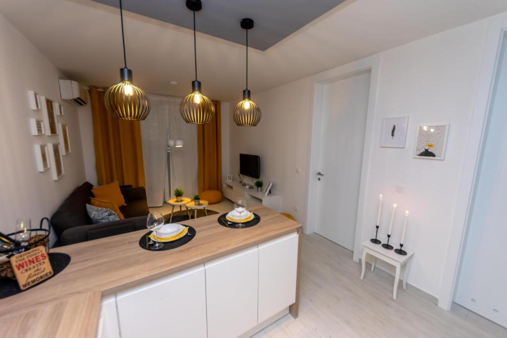Kuchyňa alebo kuchynka v ubytovaní City apartment Marlo