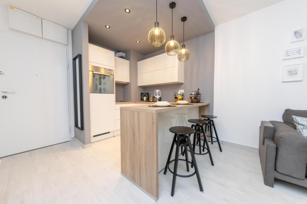 Kuchyňa alebo kuchynka v ubytovaní City apartment Marlo
