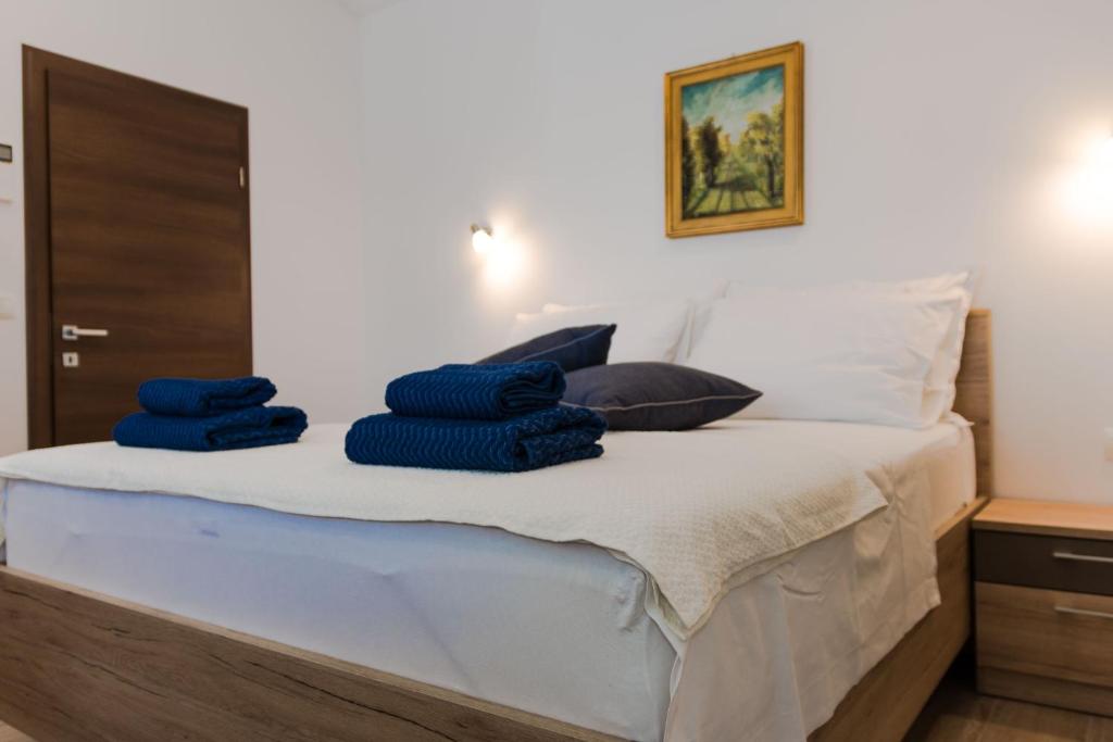 Posteľ alebo postele v izbe v ubytovaní Beachfront Apartments Don