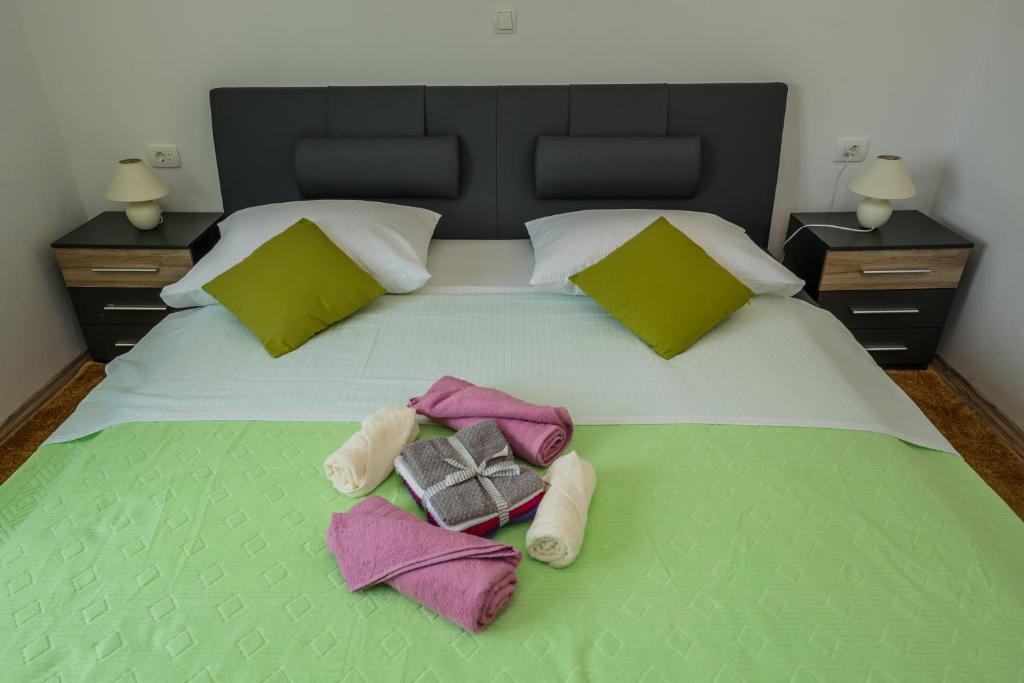Posteľ alebo postele v izbe v ubytovaní Apartman Adriatic