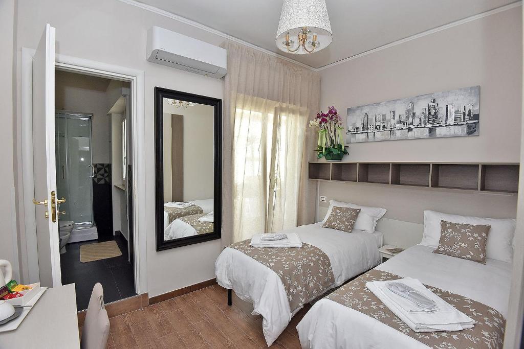 Postel nebo postele na pokoji v ubytování B&B Paradiso Relais