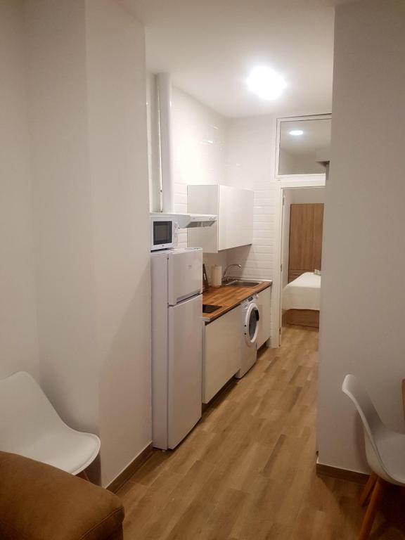 Kuchyň nebo kuchyňský kout v ubytování Apartments Naty Beach