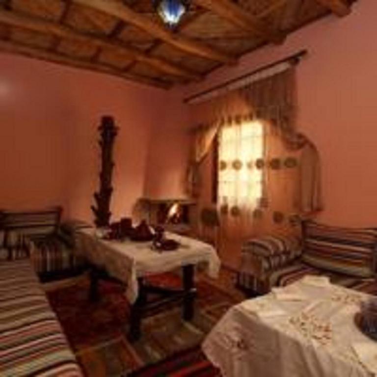 Postel nebo postele na pokoji v ubytování Imlil Lodge