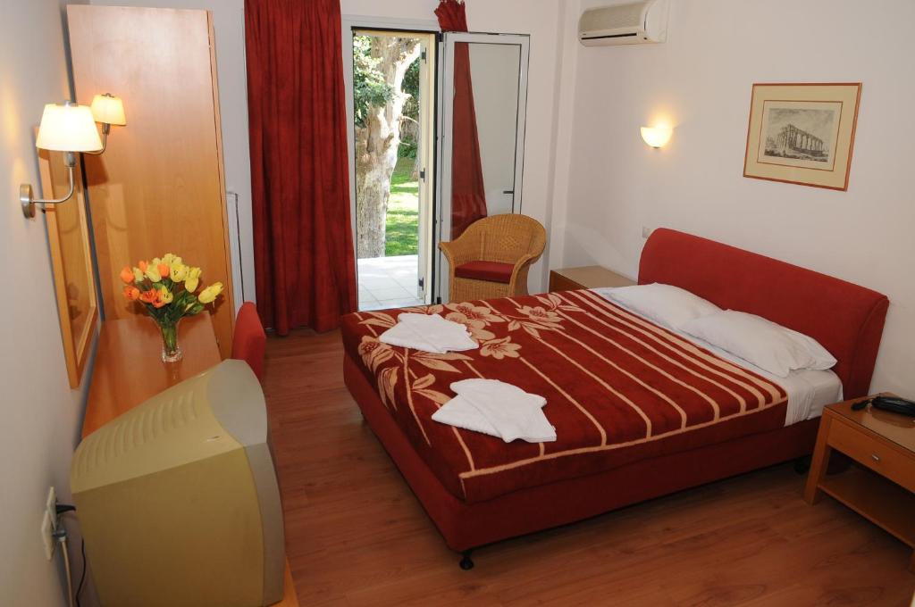 Posteľ alebo postele v izbe v ubytovaní Hotel Pantheon