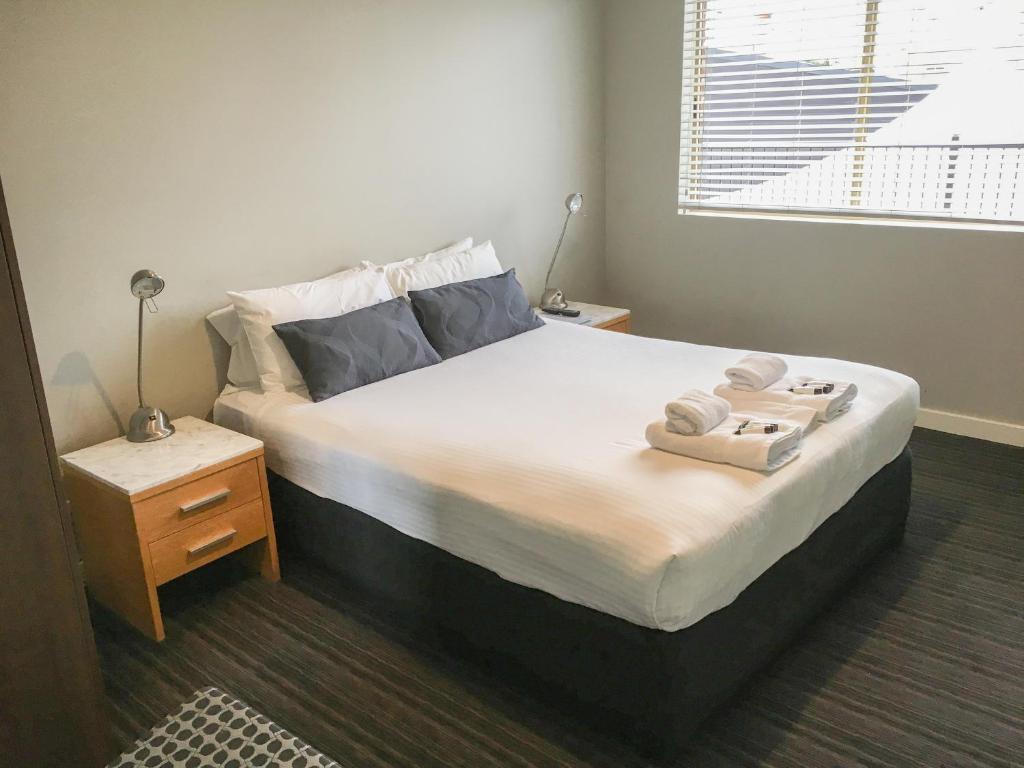 Postel nebo postele na pokoji v ubytování The Premier Hotel Broadmeadow