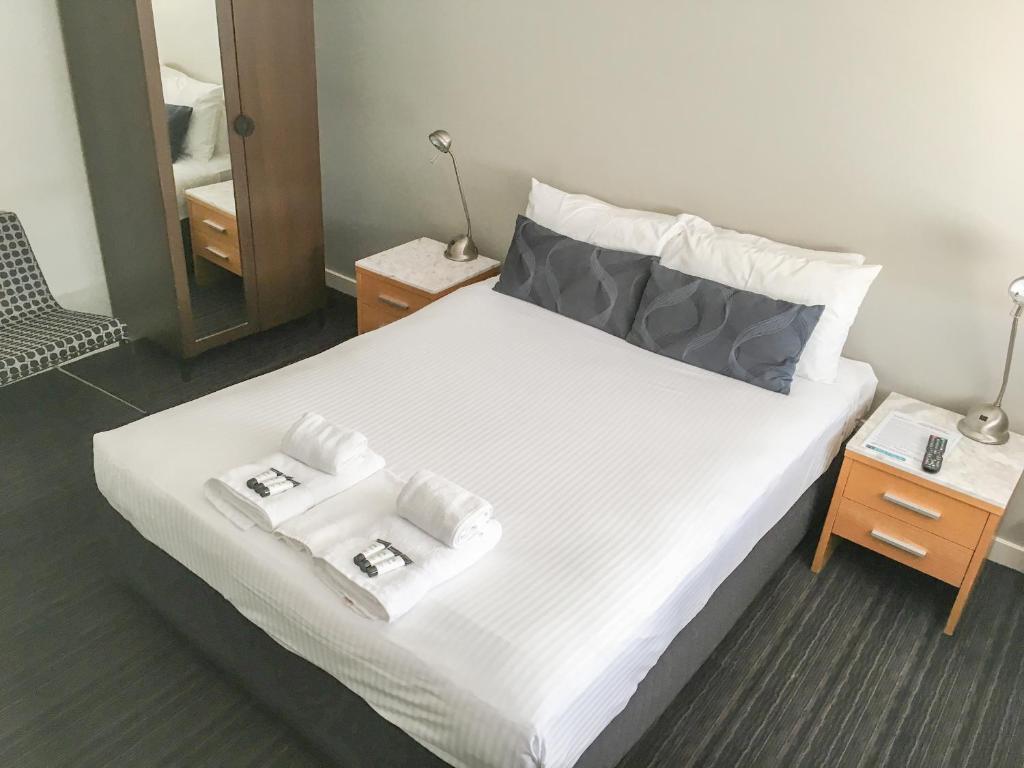 Postel nebo postele na pokoji v ubytování The Premier Hotel Broadmeadow