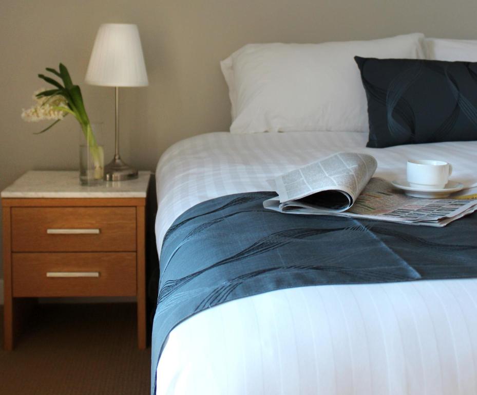 Postel nebo postele na pokoji v ubytování The Premier Hotel Broadmeadow