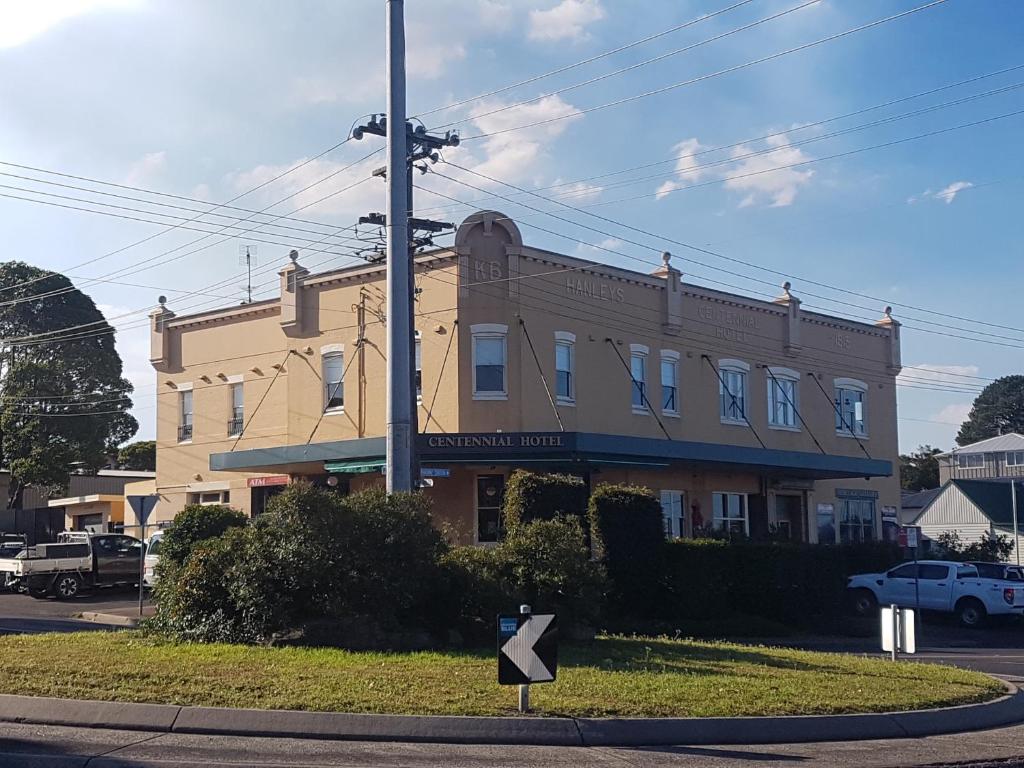 a building on the corner of a street at Helensburgh Hotel in Helensburgh