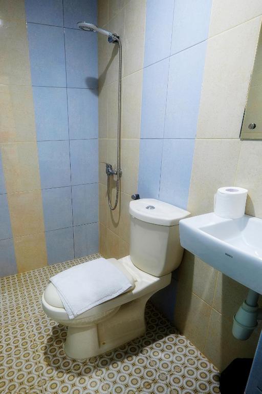 Koupelna v ubytování Arya Inn