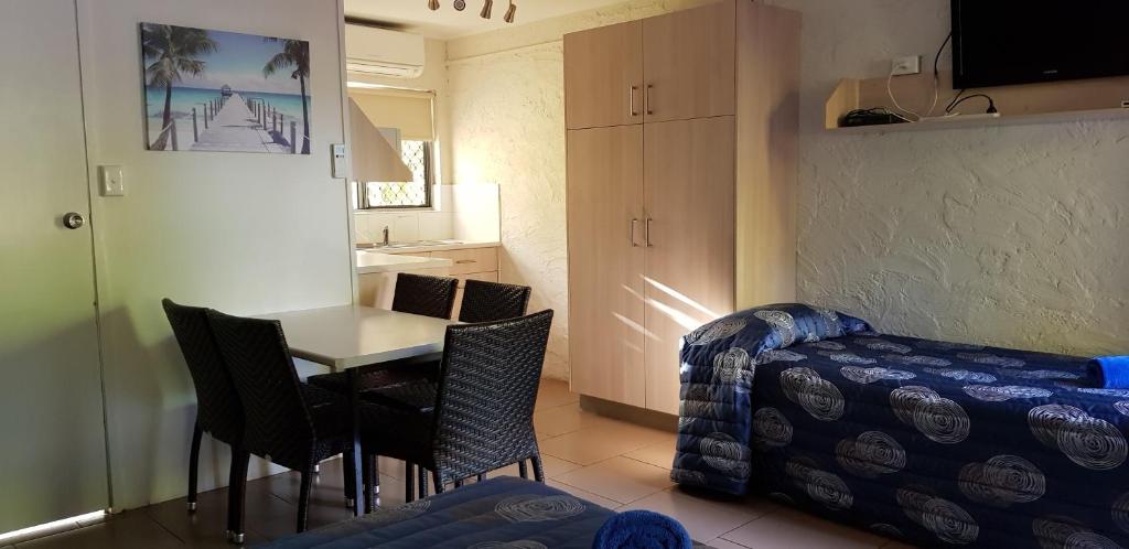 Posezení v ubytování Mango Tree Motel