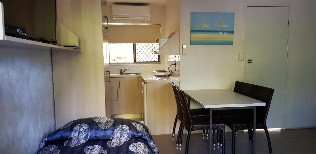 Kuchyň nebo kuchyňský kout v ubytování Mango Tree Motel