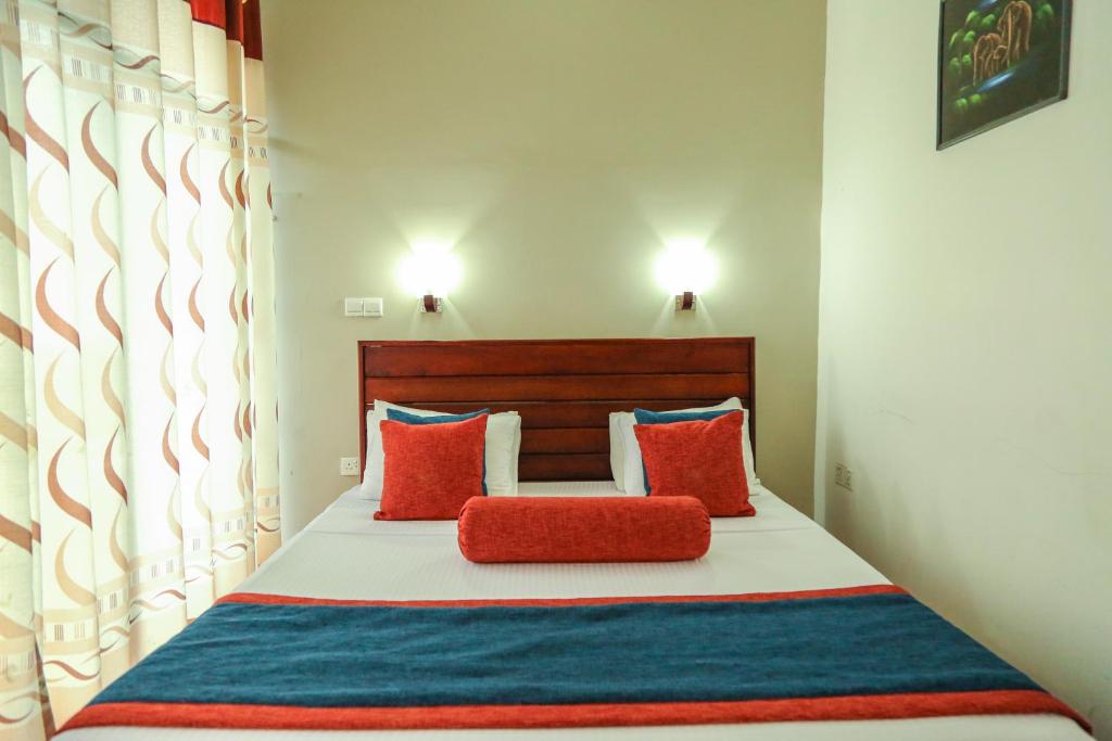 Postel nebo postele na pokoji v ubytování Oak Ray Ella Gap Hotel
