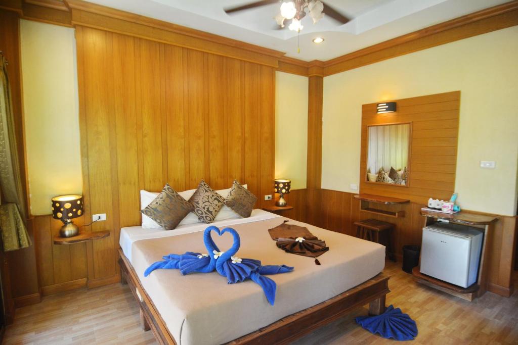 Postel nebo postele na pokoji v ubytování Kantiang Bay View Resort