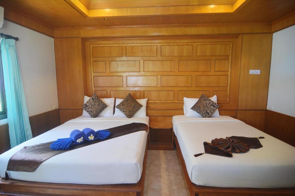 Postel nebo postele na pokoji v ubytování Kantiang Bay View Resort