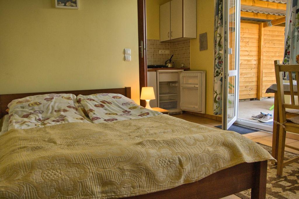 Postel nebo postele na pokoji v ubytování Pod Jesionem