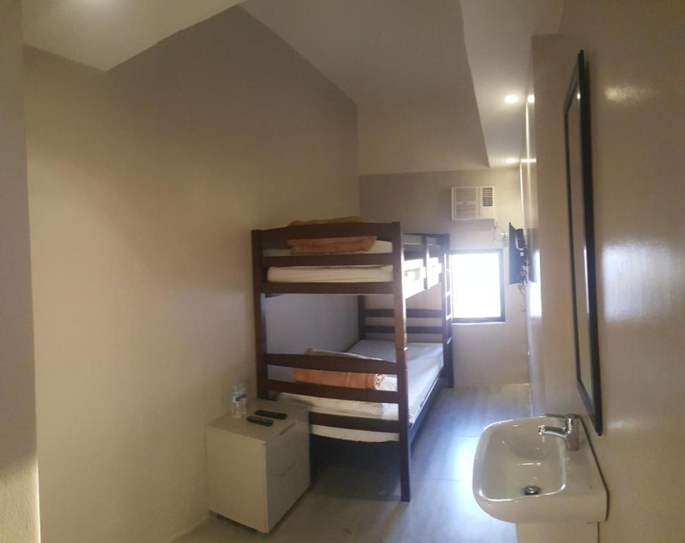 Koupelna v ubytování Mabolo Royal Hotel