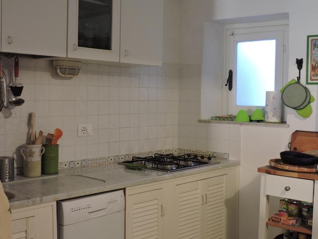 Kuchyňa alebo kuchynka v ubytovaní La Casa nel Borgo