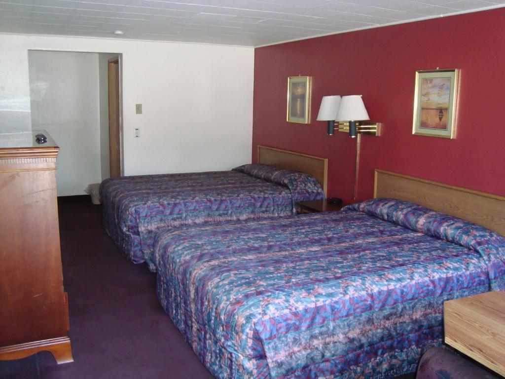 Postel nebo postele na pokoji v ubytování Willow Springs Motel