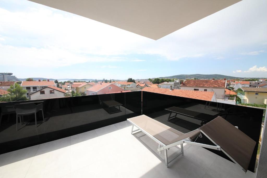 Rõdu või terrass majutusasutuses Hotel Scala d'Oro