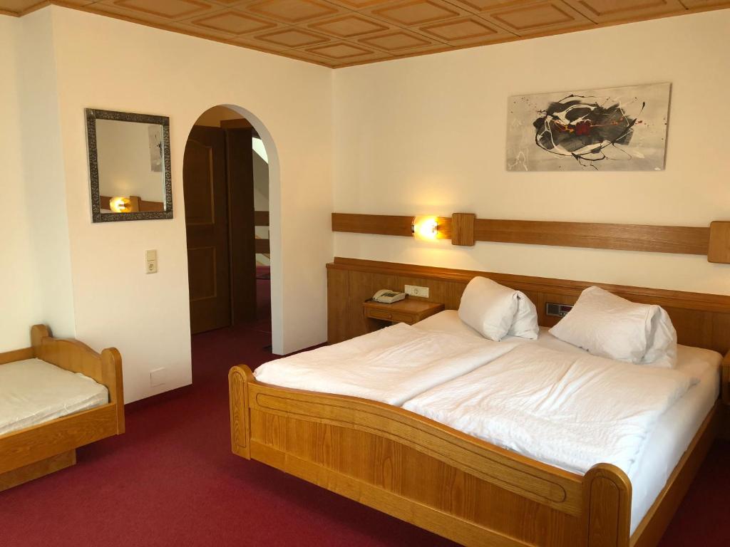Postel nebo postele na pokoji v ubytování Landhaus Brigitte