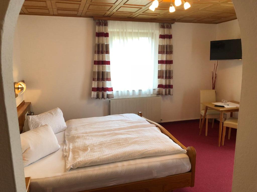 Postel nebo postele na pokoji v ubytování Landhaus Brigitte