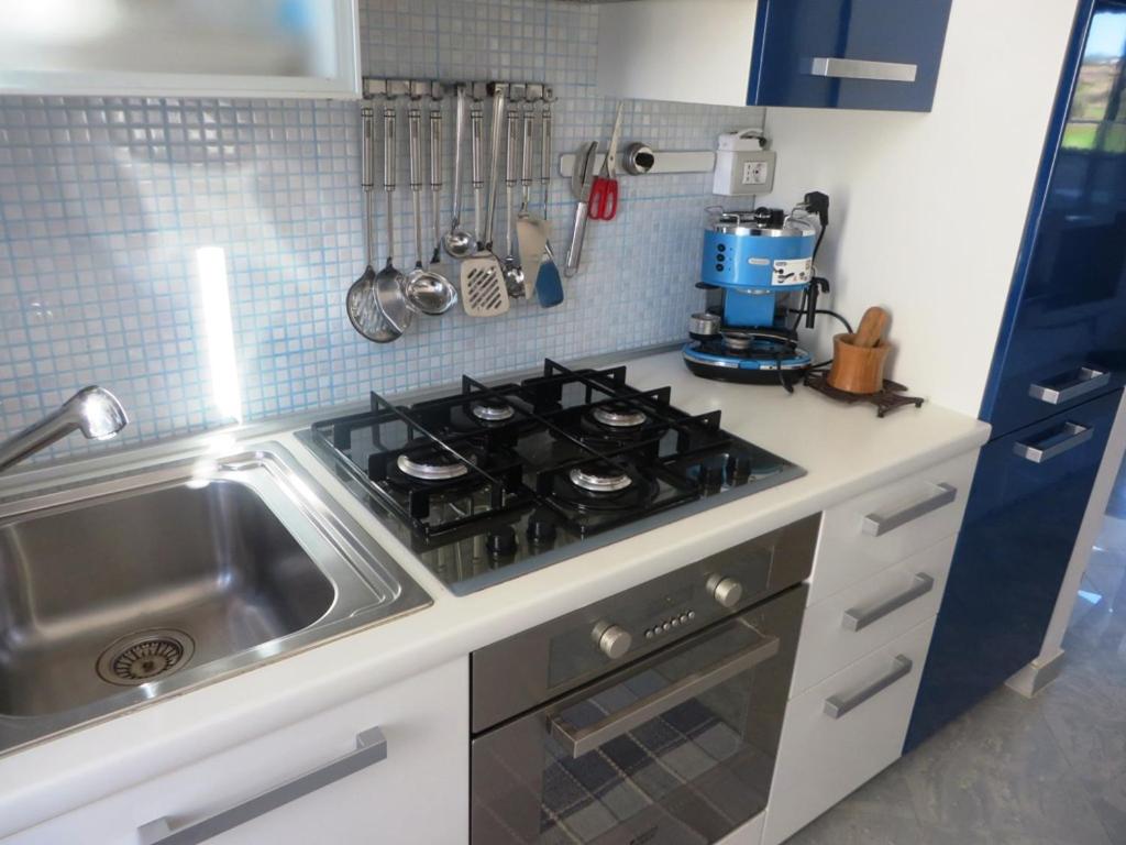 Kuchyň nebo kuchyňský kout v ubytování Residence Giglio