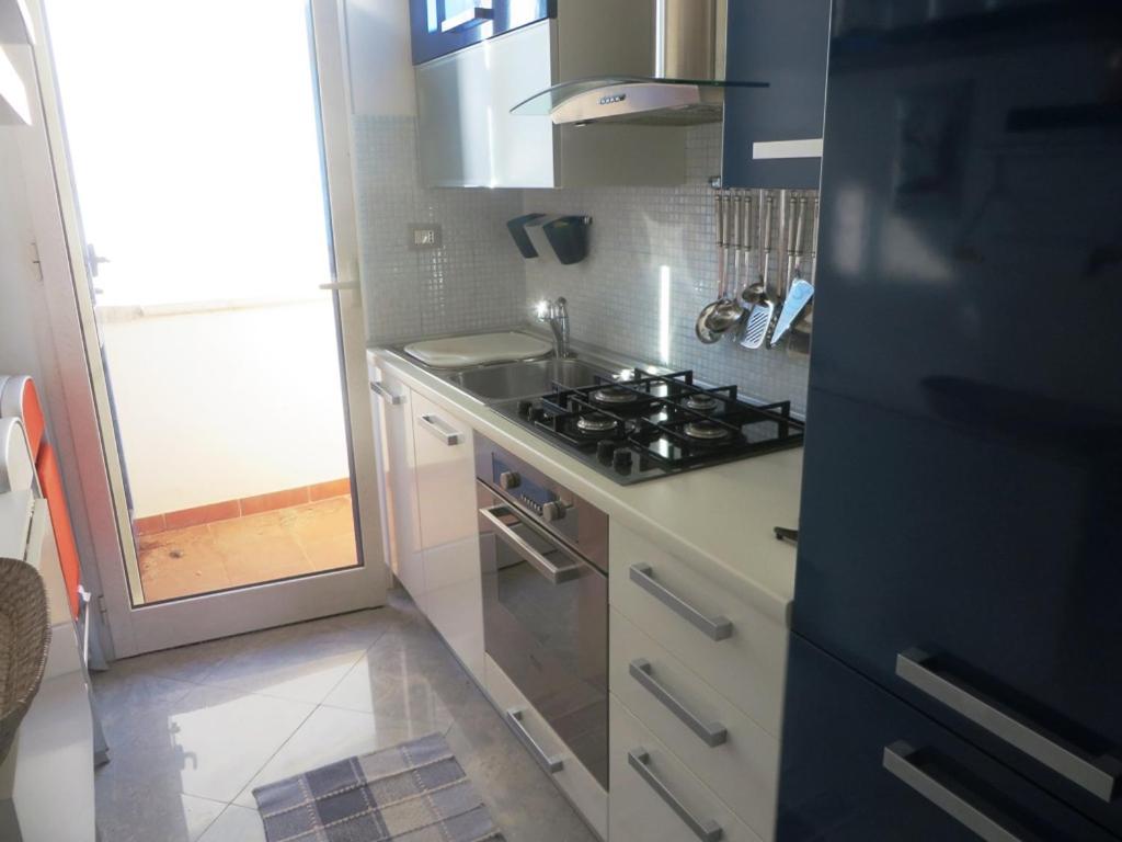 Kuchyň nebo kuchyňský kout v ubytování Residence Giglio