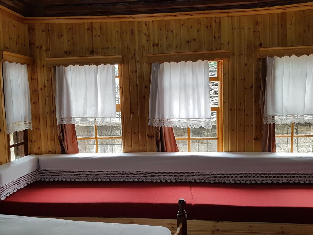 Postel nebo postele na pokoji v ubytování Eva Guesthouse